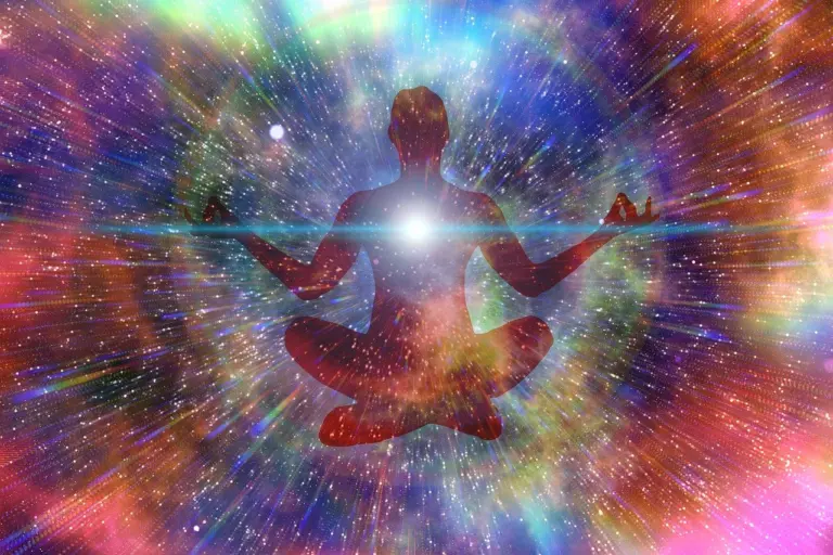 A meditating figure in light